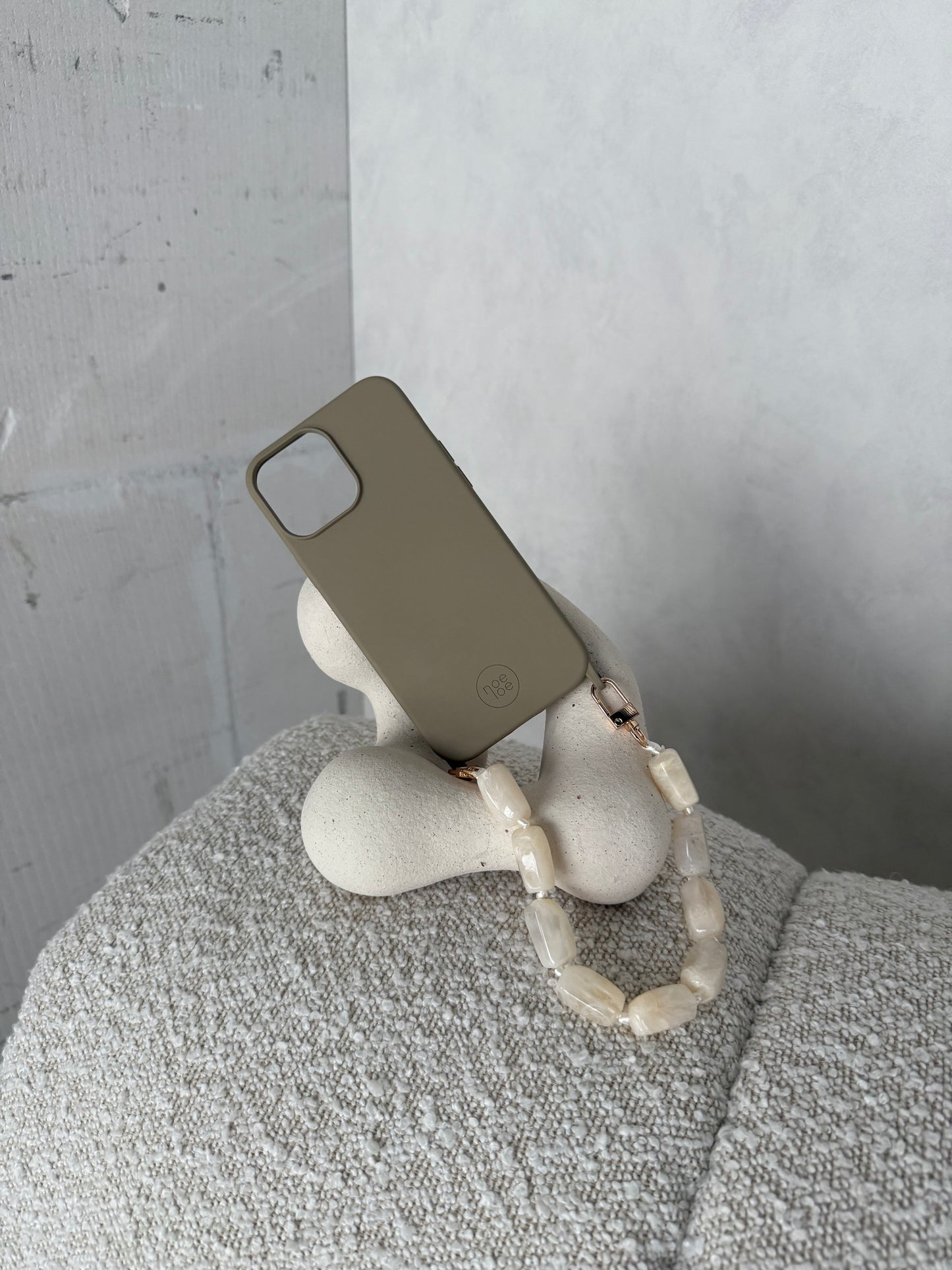 Taupe/groen hoesje + koord