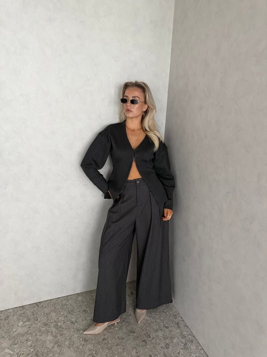 Grijs vestje met knoopjes