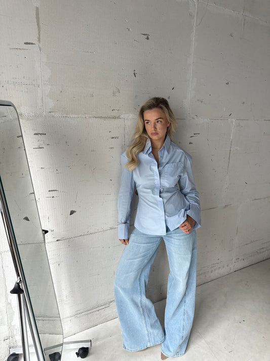 Blouse blauw met schoudervulling