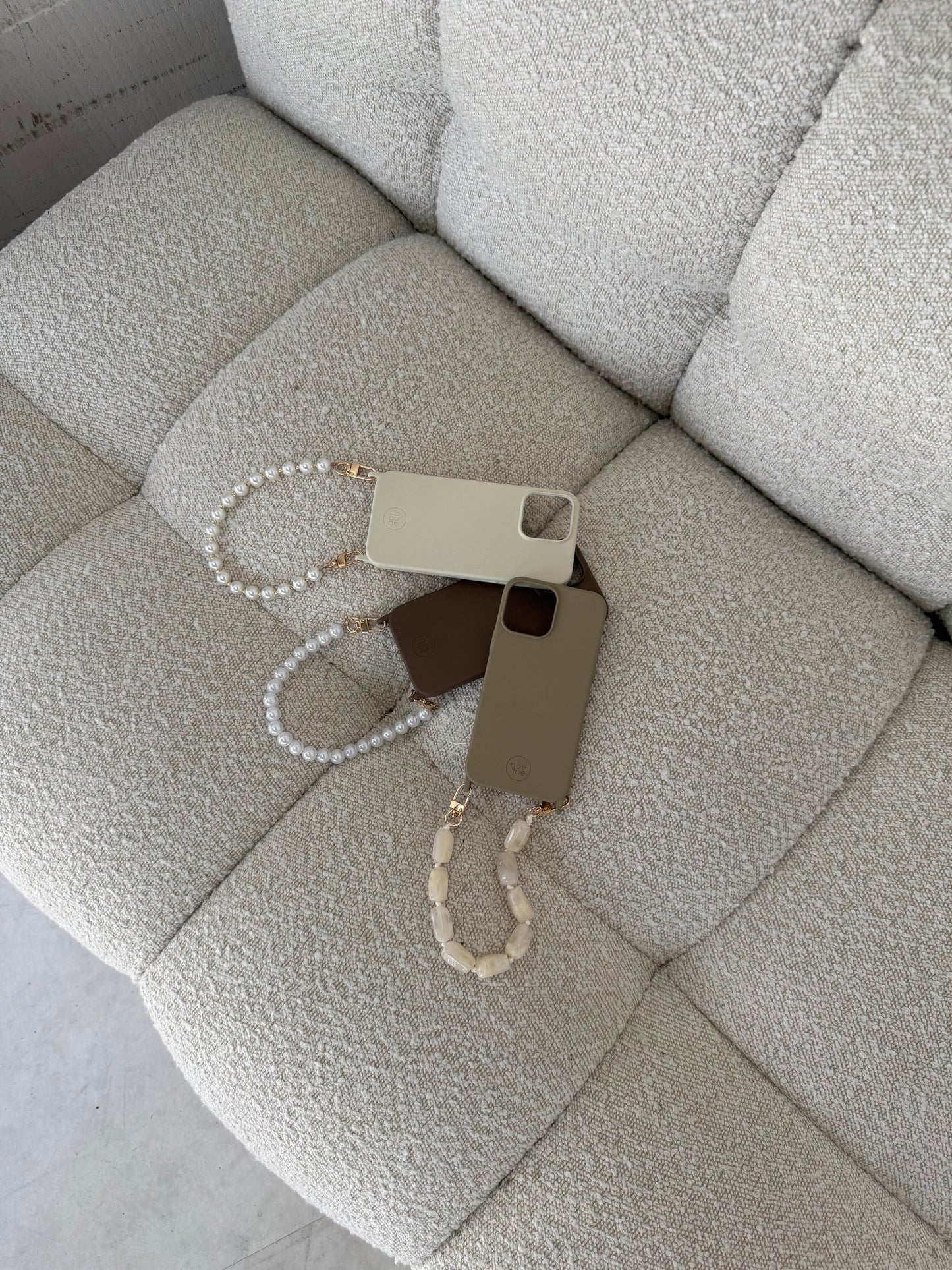 Taupe/groen hoesje + koord