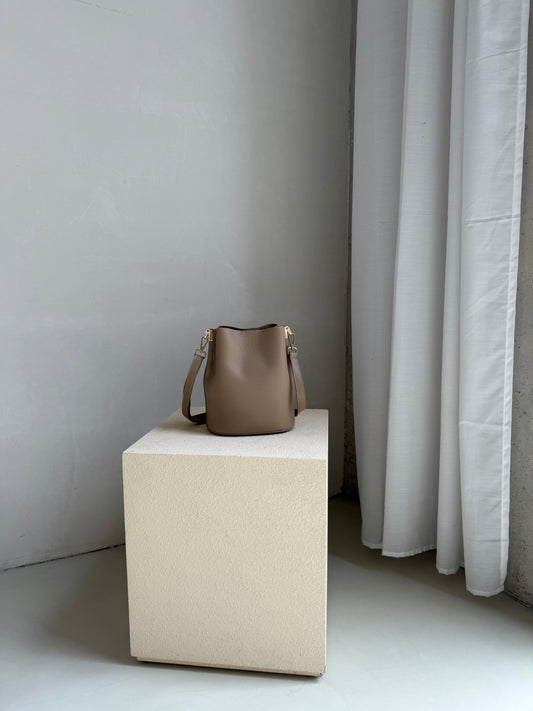 Tas taupe rond