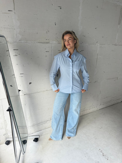 Blouse blauw met schoudervulling