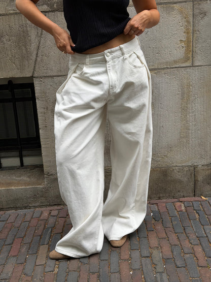 Creme broek met plooi