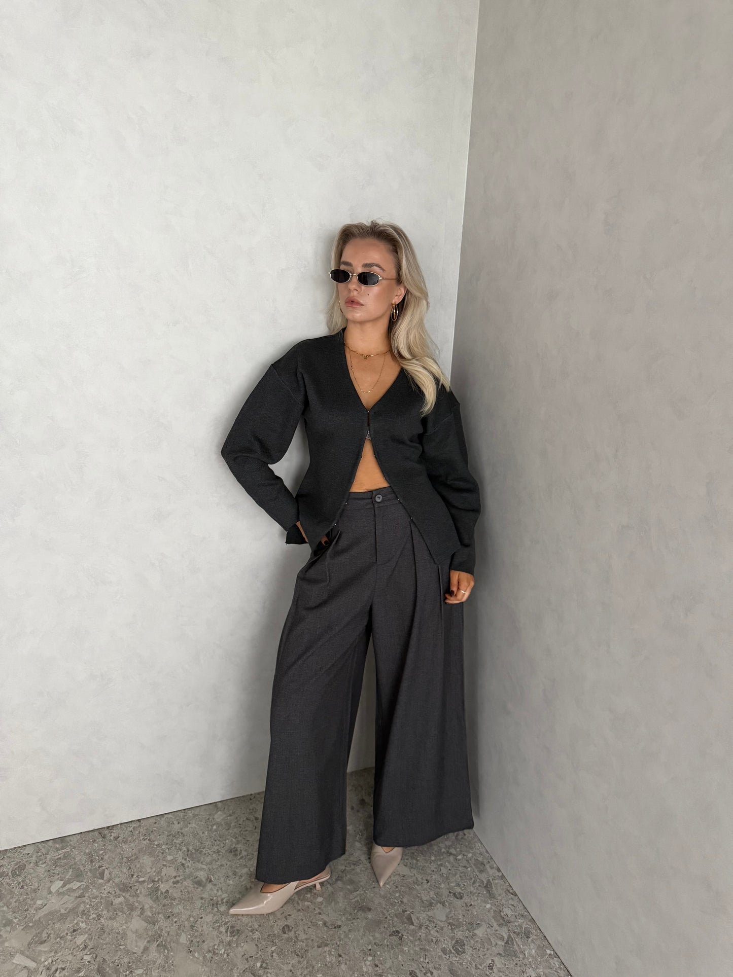 Grijs vestje met knoopjes