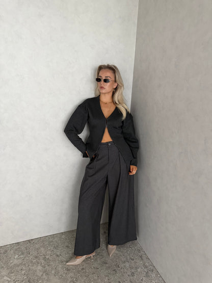 Grijs vestje met knoopjes