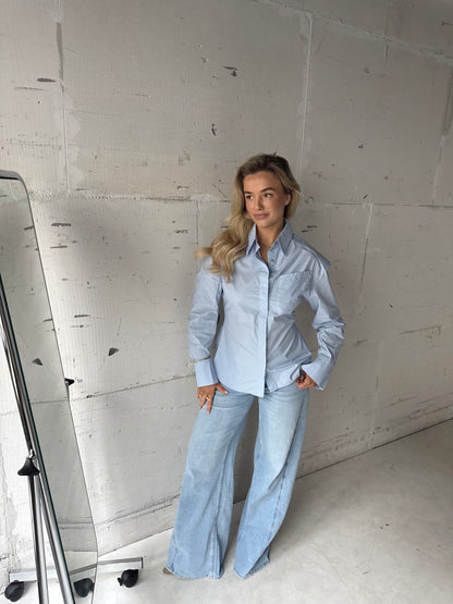 Blouse blauw met schoudervulling