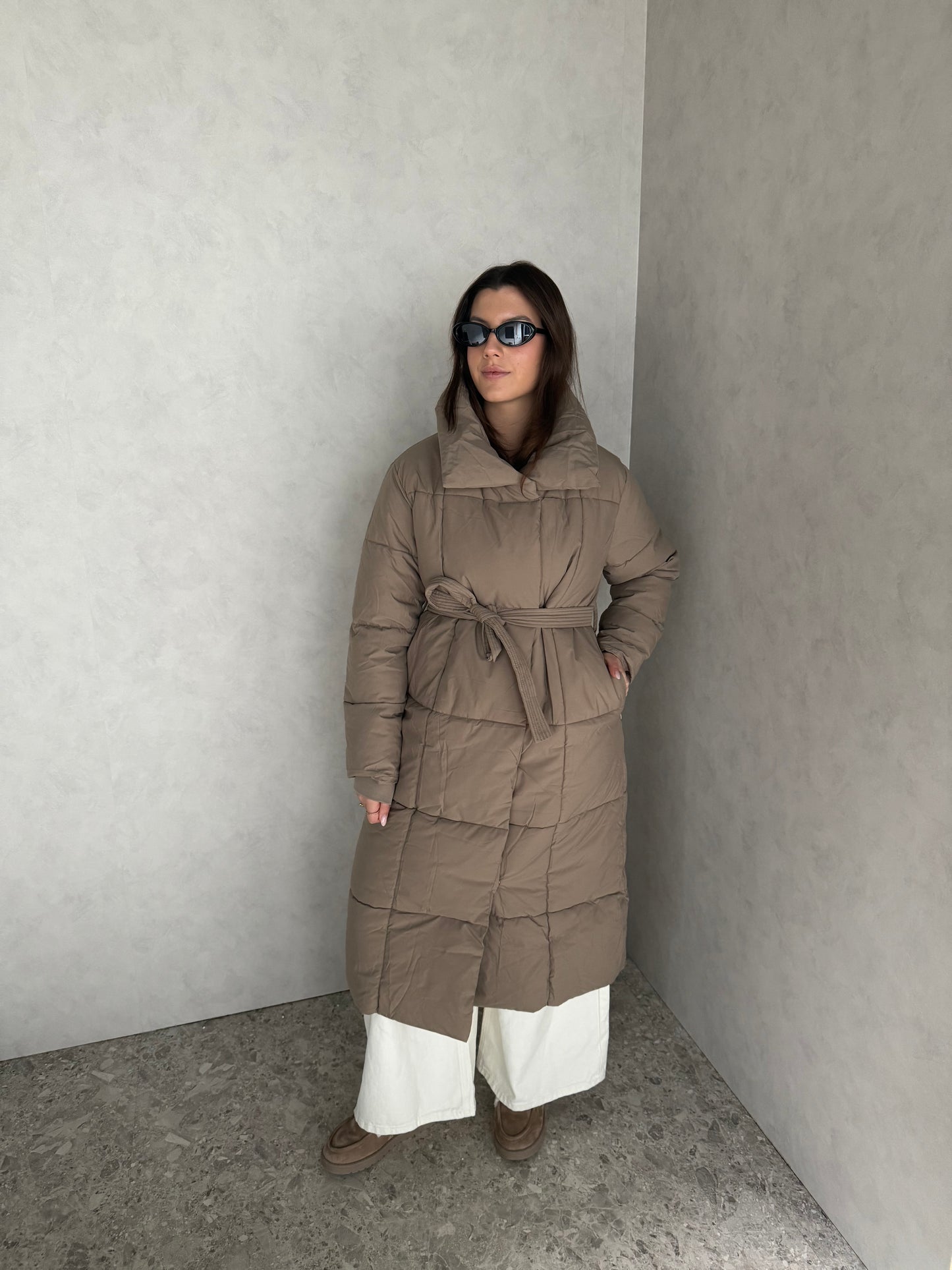 Lange puffer jas taupe