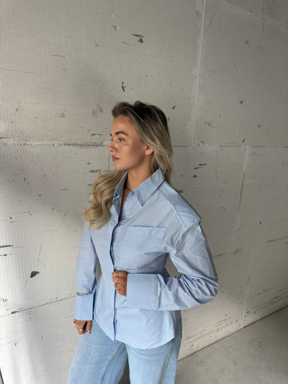 Blouse blauw met schoudervulling