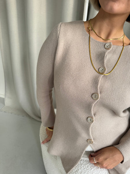 Vest gouden knopen