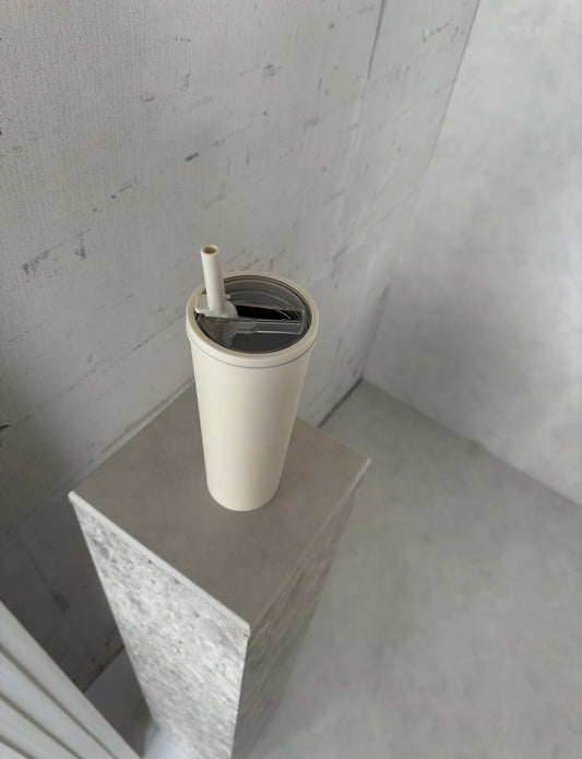 Cup with straw