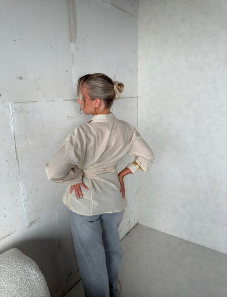 Blouse met knoop