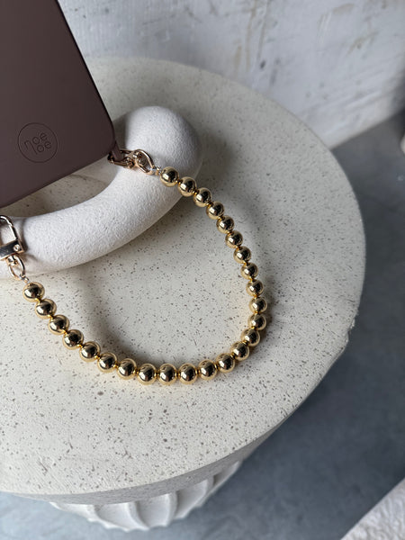 Bruin hoesje + goud koordje
