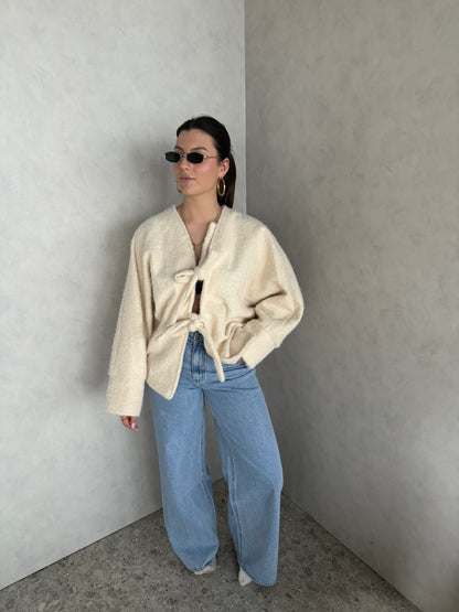 Vest beige met strik