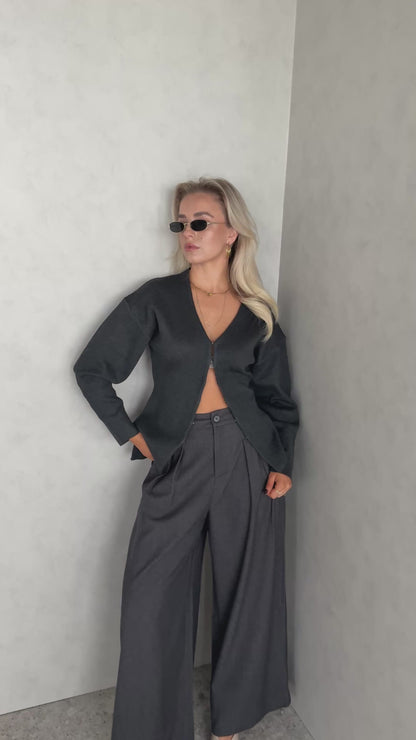 Grijs vestje met knoopjes